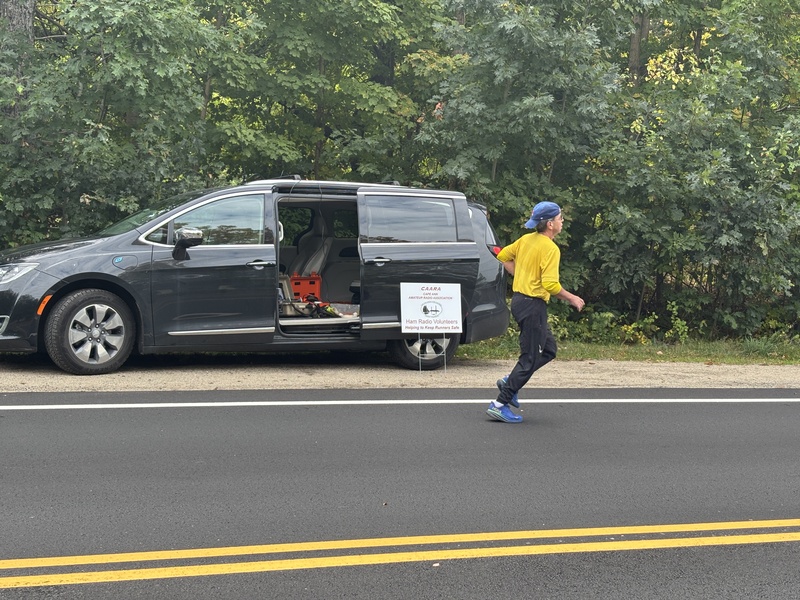 A photo of my van with the door open so you can see the radio inside