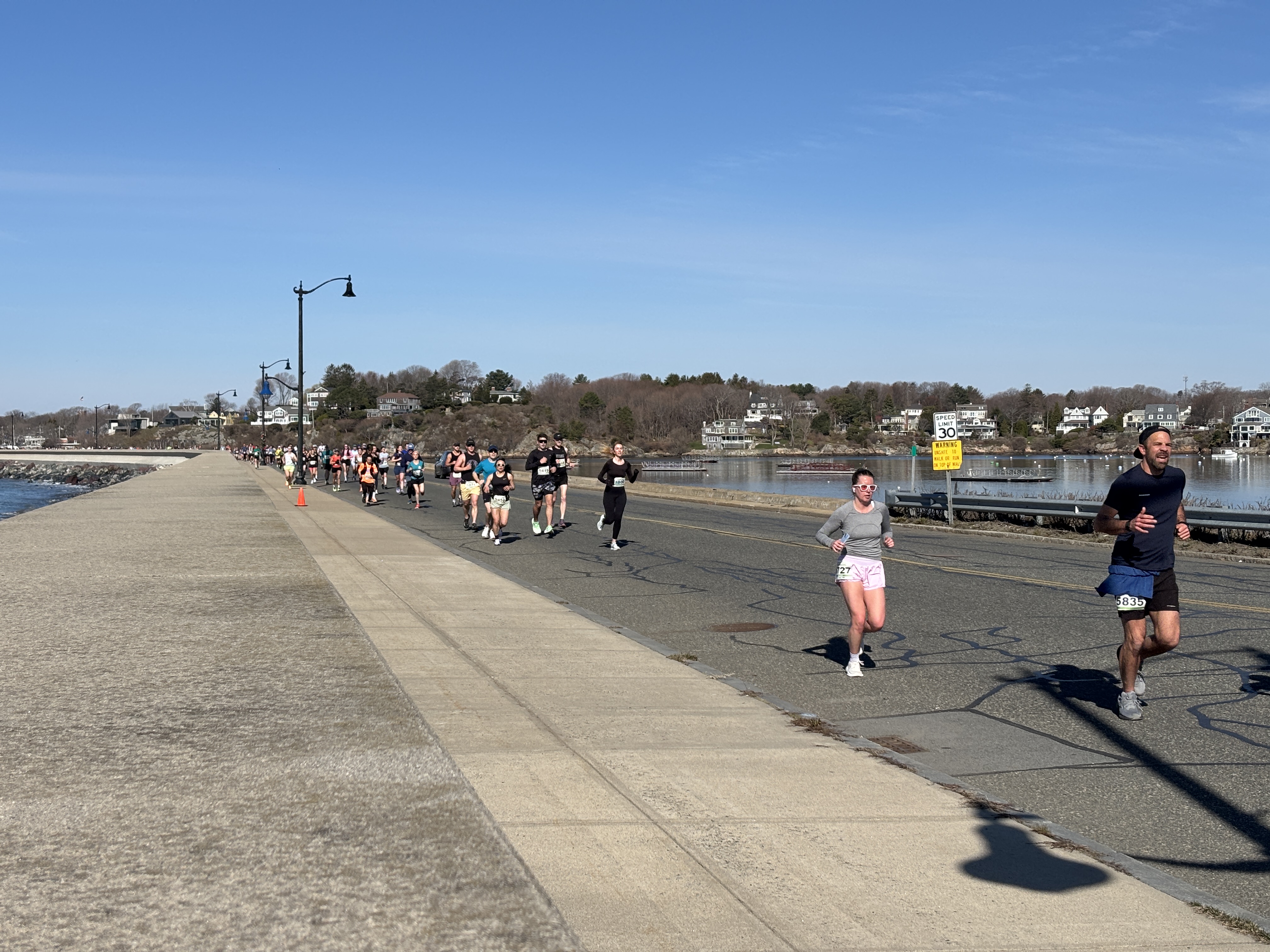 Runners passing checkpoint 1
