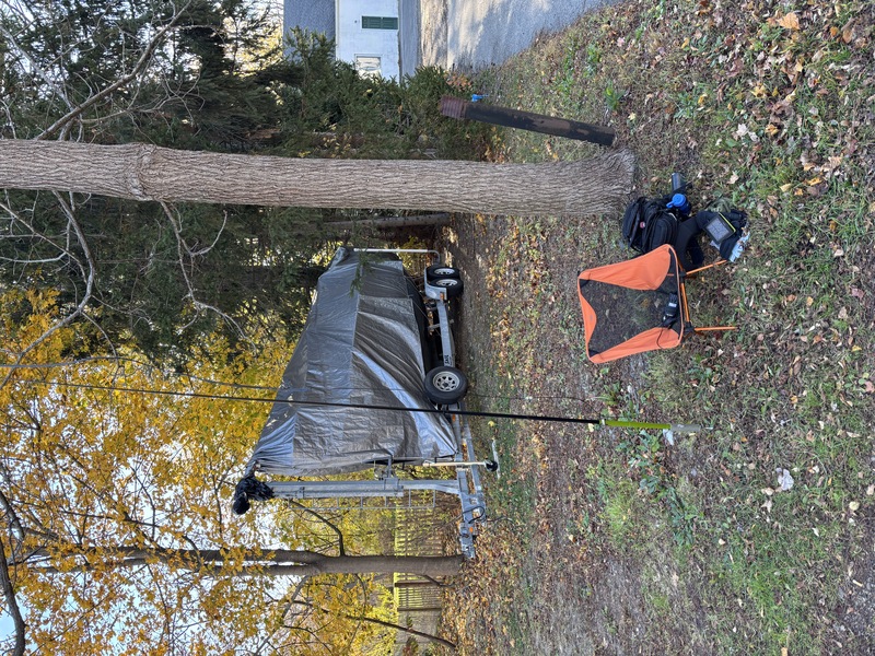 Picture of camping chair, backpack, and antenna